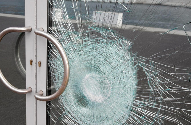 Broken Door in laminated Liverpool laminated Safety Glass